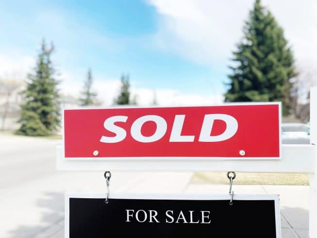 Sold Sign On A House In A Hot Real Estate Market